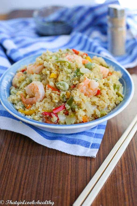 Stir fried quinoa with vegetables and shrimp in a bowl