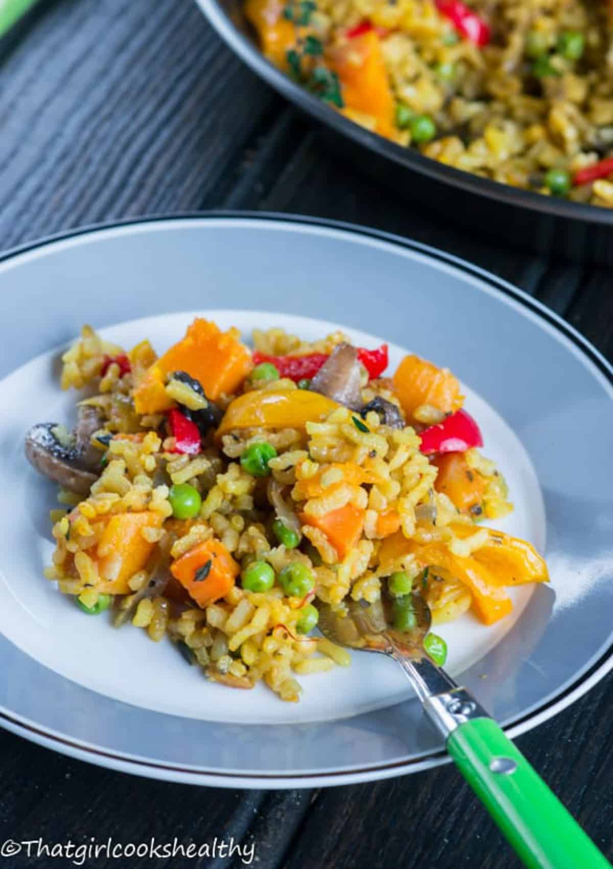 Small portion of paella in a side dish