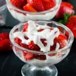 Strawberries and whipped cream overhead shot