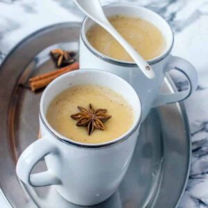 two cups of porridge on a tray