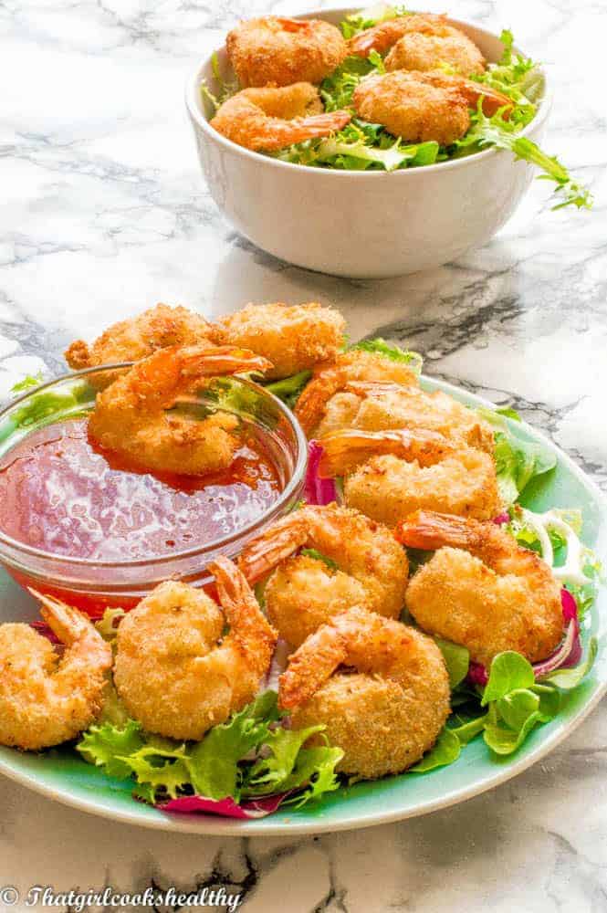 A plate of crispy cocont low carb air fryer shrimp