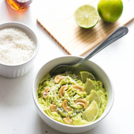 10 minute key lime pudding key lime pudding in a bowl with coconut and cashew nuts