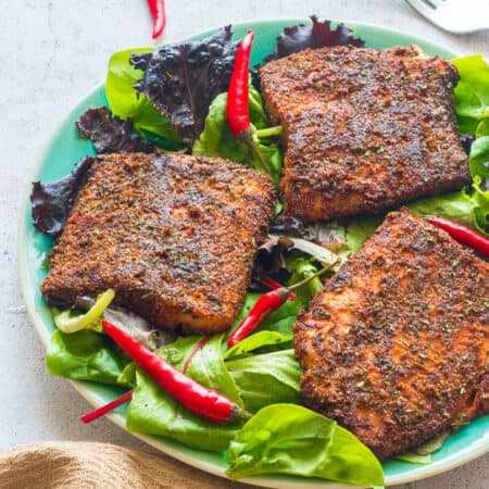 Red chillis with the fillets of salmon