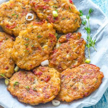 Jamaican saltfish fritters Saltfish fritters with thyme on a plate