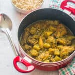 Curry chicken in a red pot