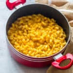 Sweet potato mac and cheese in a red pot