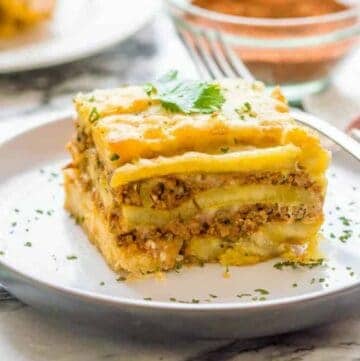 lasagna on a plate with a fork