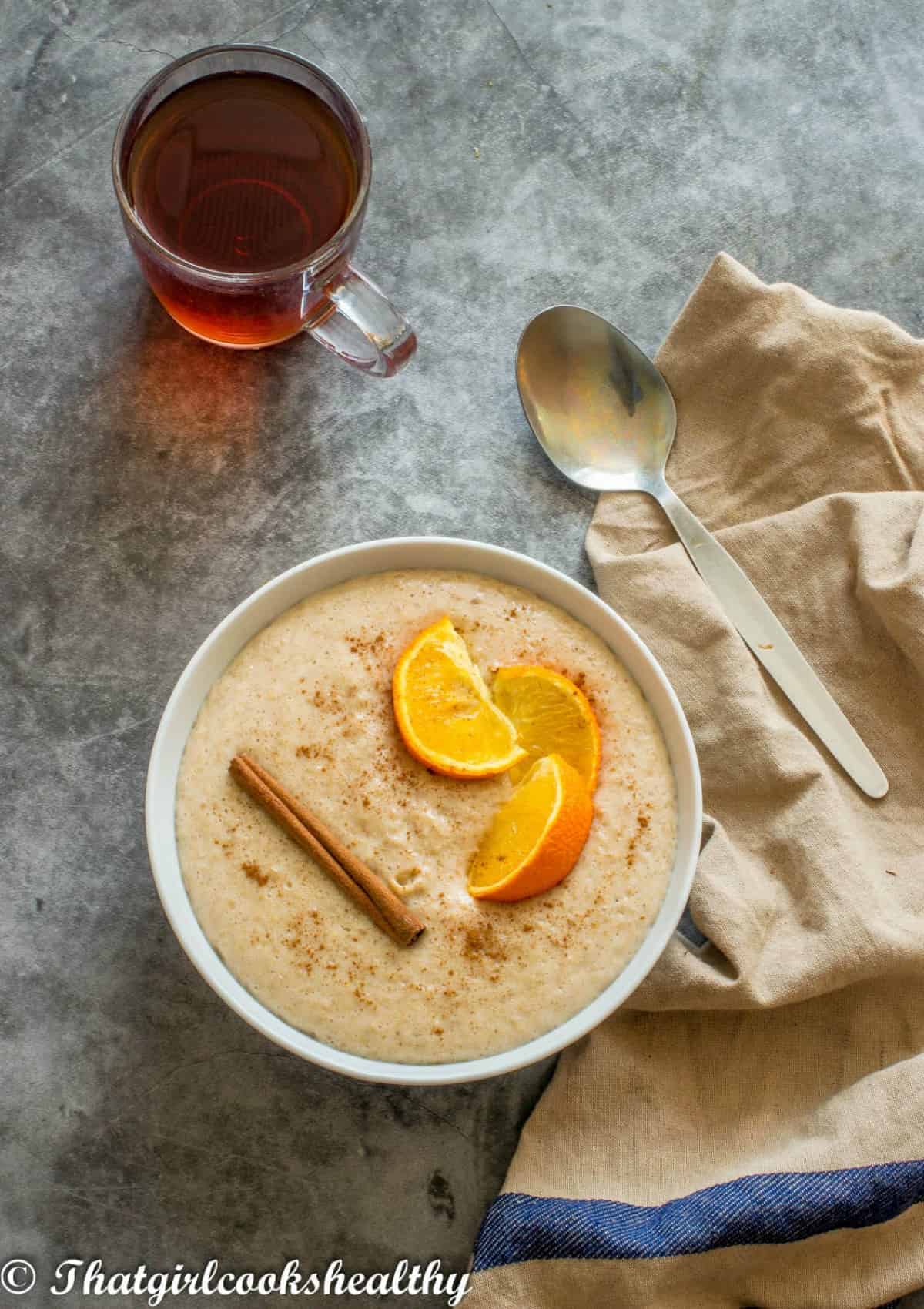 porridge with tea and spoon