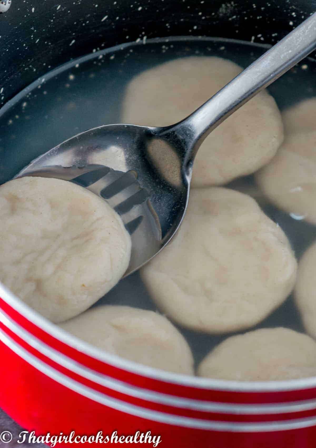 dumpling on a slotted spoon