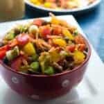 salad in a red bowl