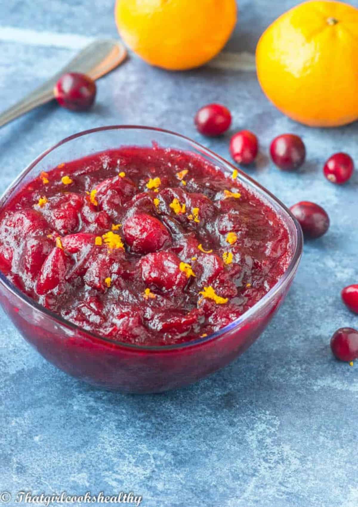 cranberry with two oranges