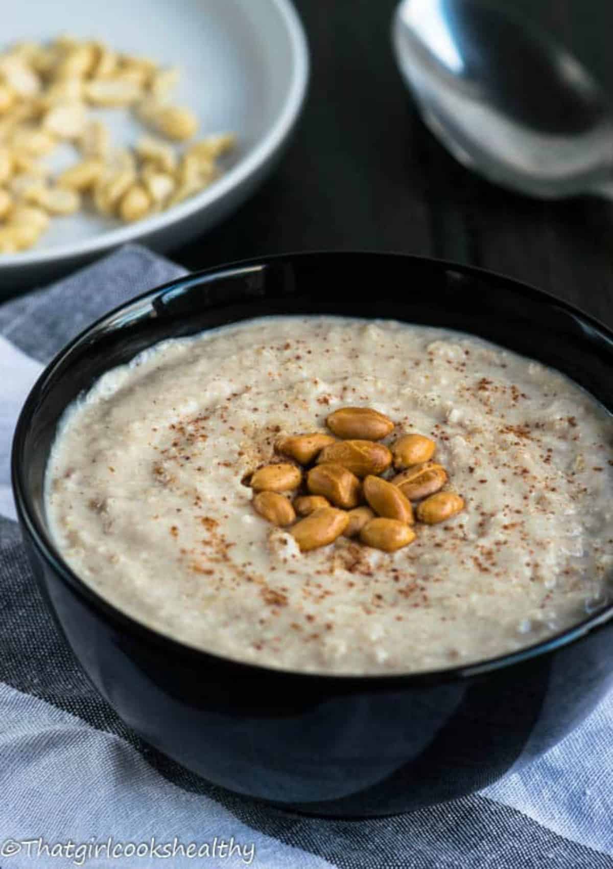 porridge with peanut garnish