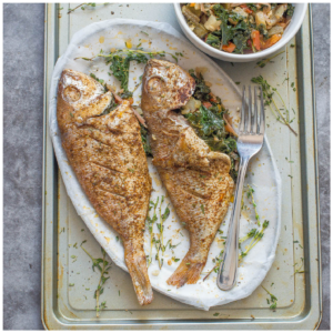 Stuffed fish on a baking tray