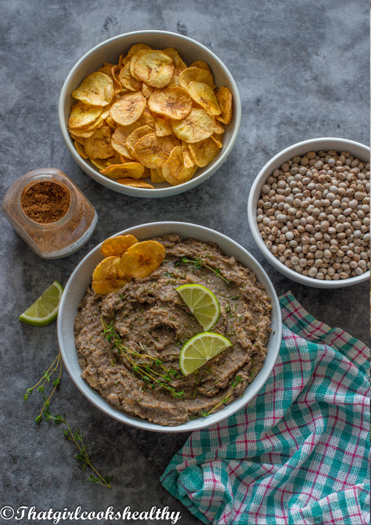 Refried beans, plantain chips and gungo peas all together