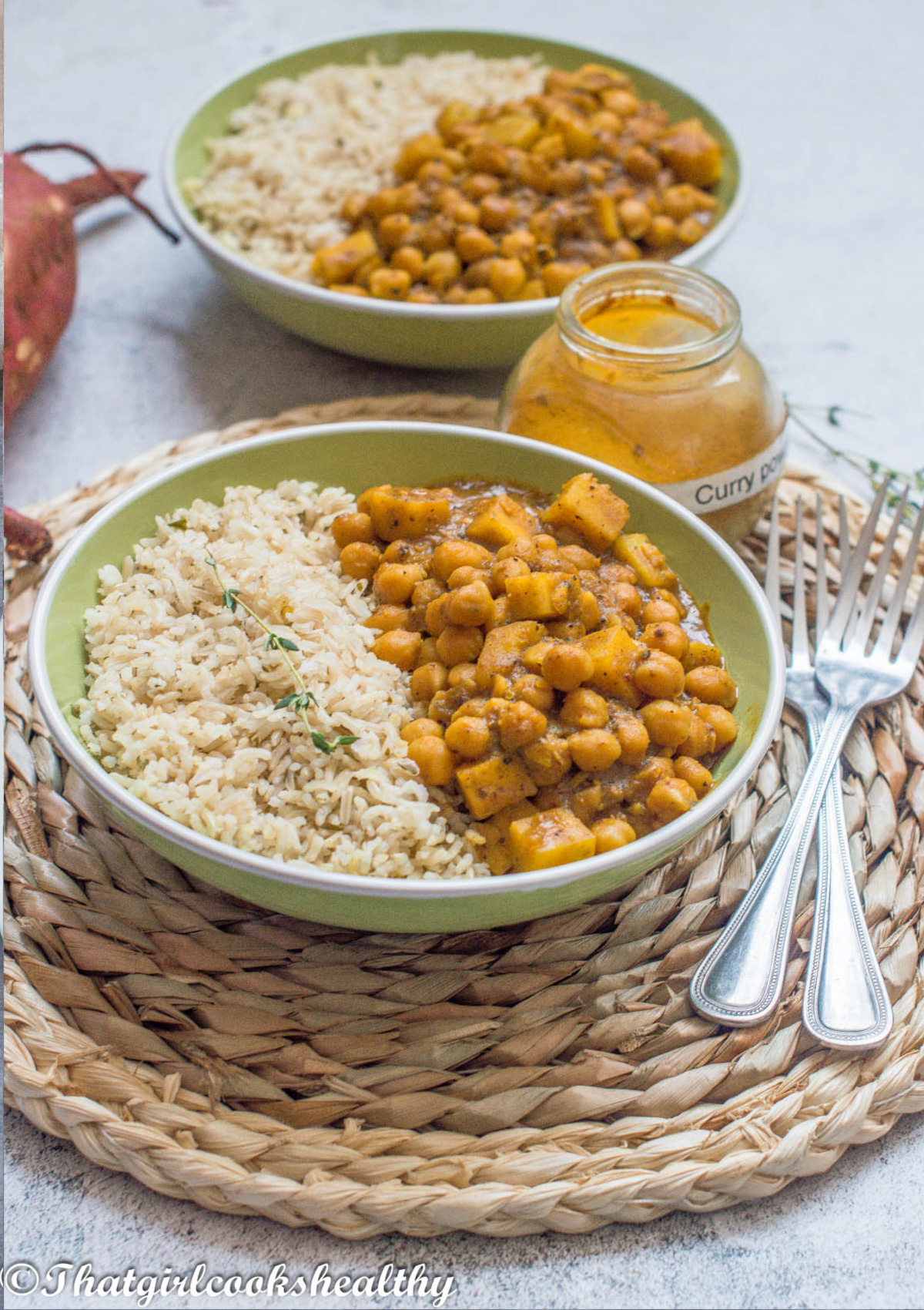 chickpeas and rice in a green bowl