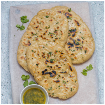 3 naans on a board