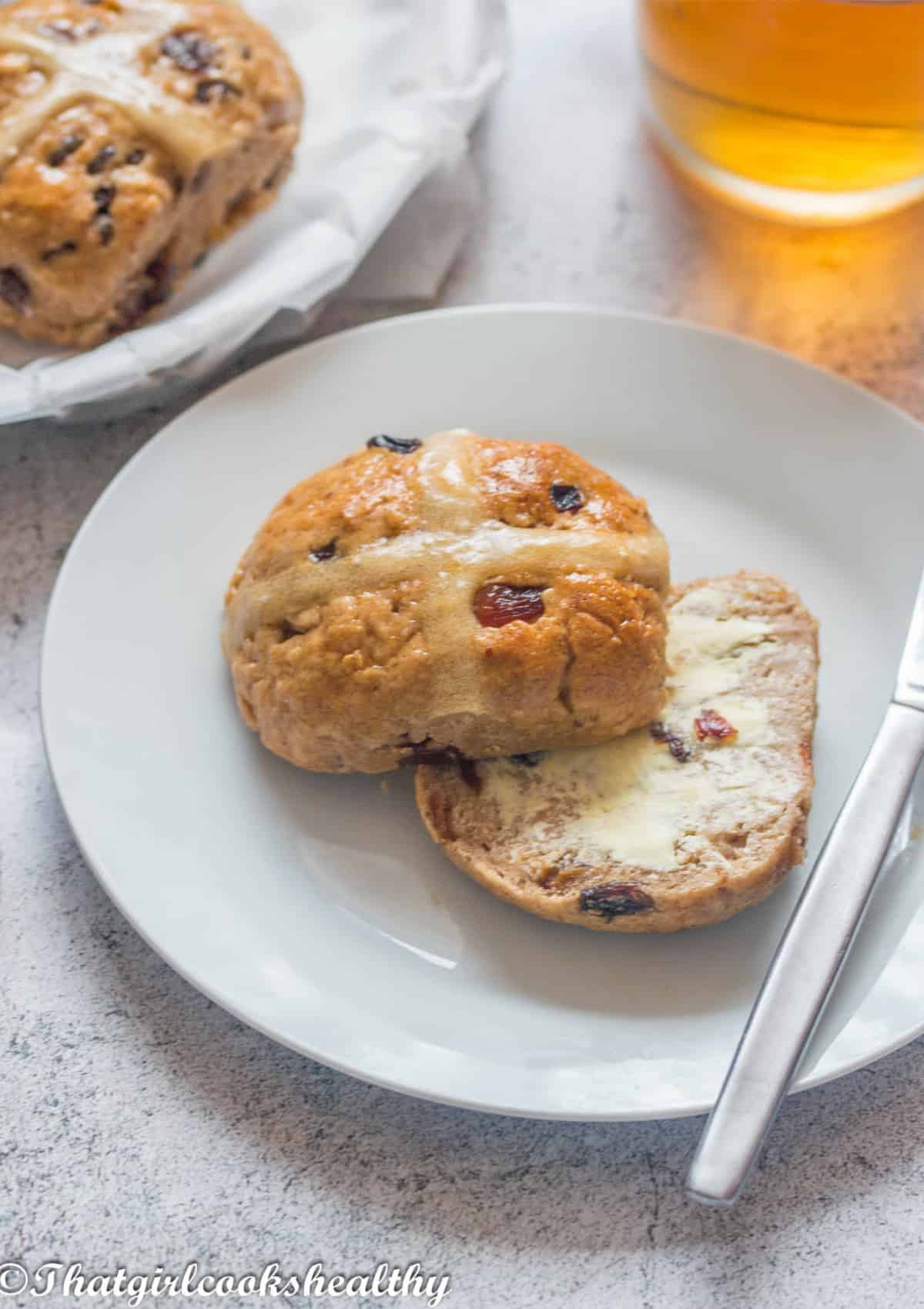 Hot cross bun with vegan butter