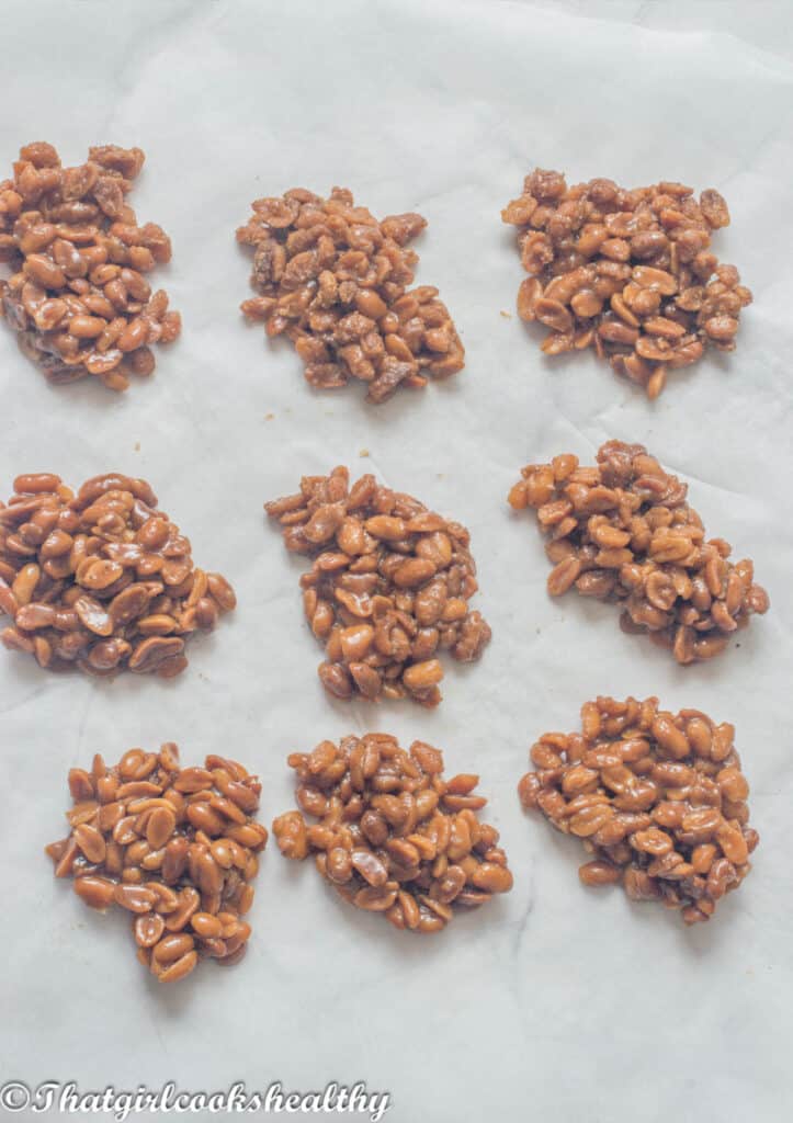 9 peanut drops on parchment paper