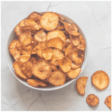 Yuca chips in a white bowl
