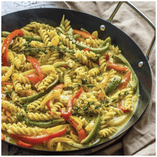Colourful pasta in a skillet
