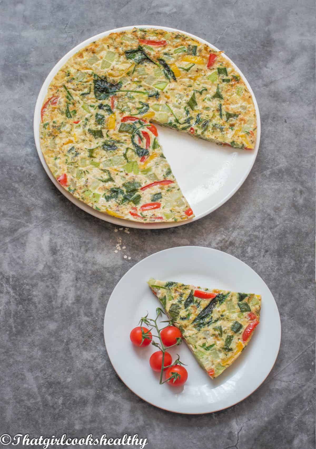 Partially sliced omelette on a plate