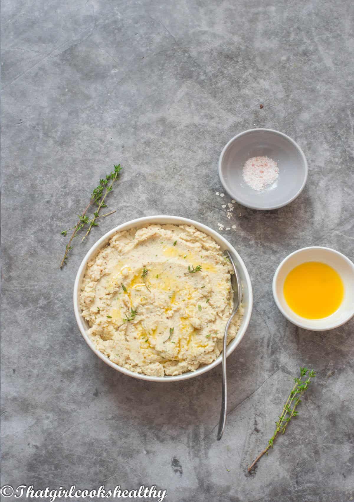 Mash in a white bowl with garnish