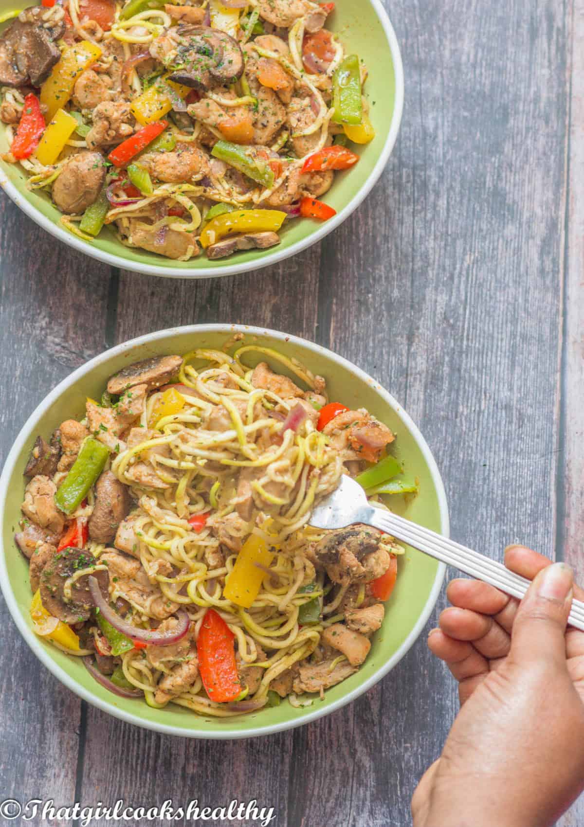 Using a fork to scoop the food