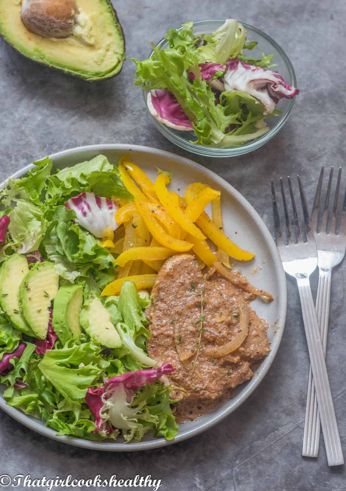 Tuna steaks, avocado, fresh salad and peppers