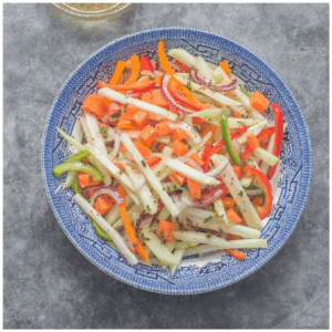 colourful salad in a blue bowl