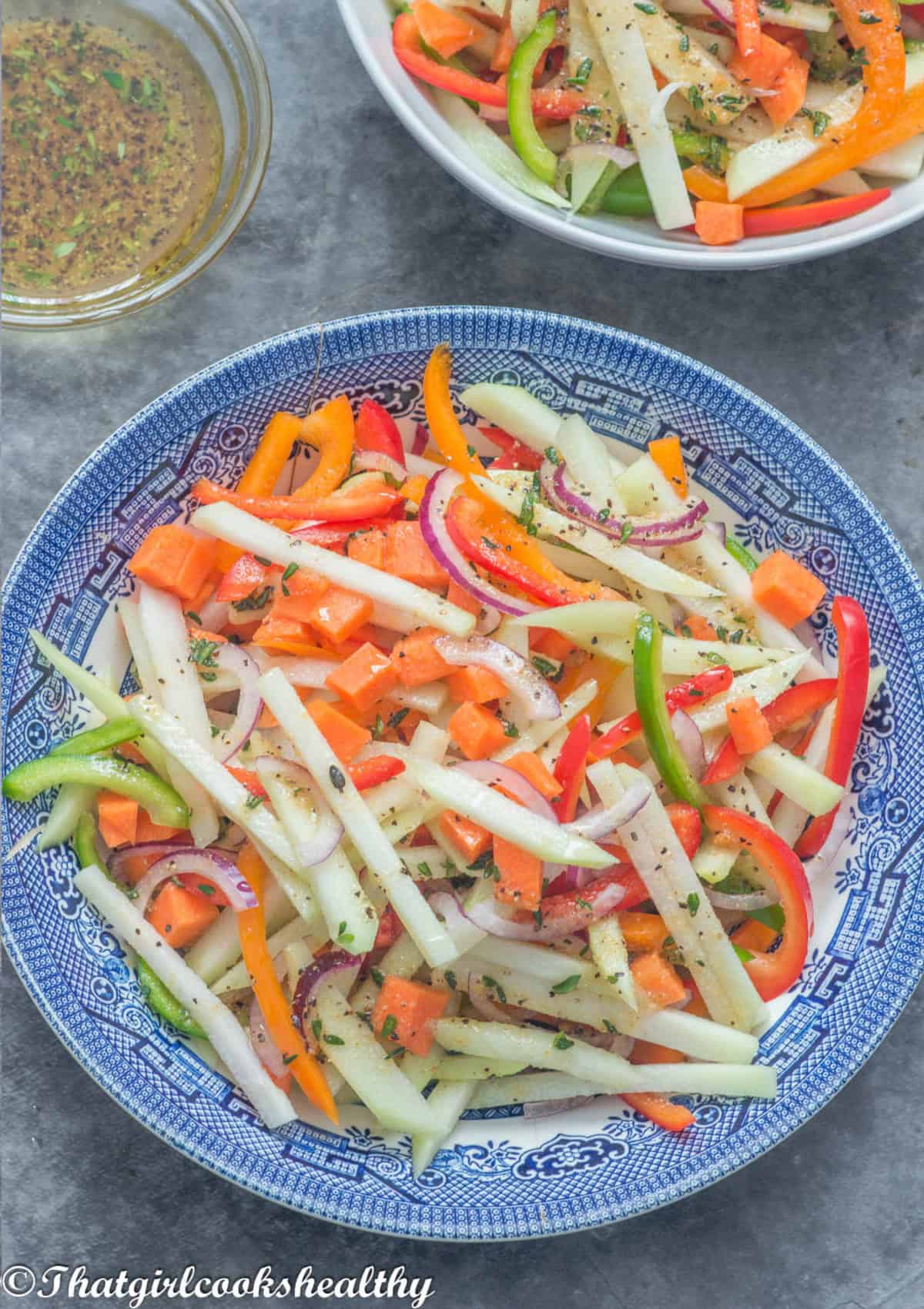 Close of the salad in a blue bowl
