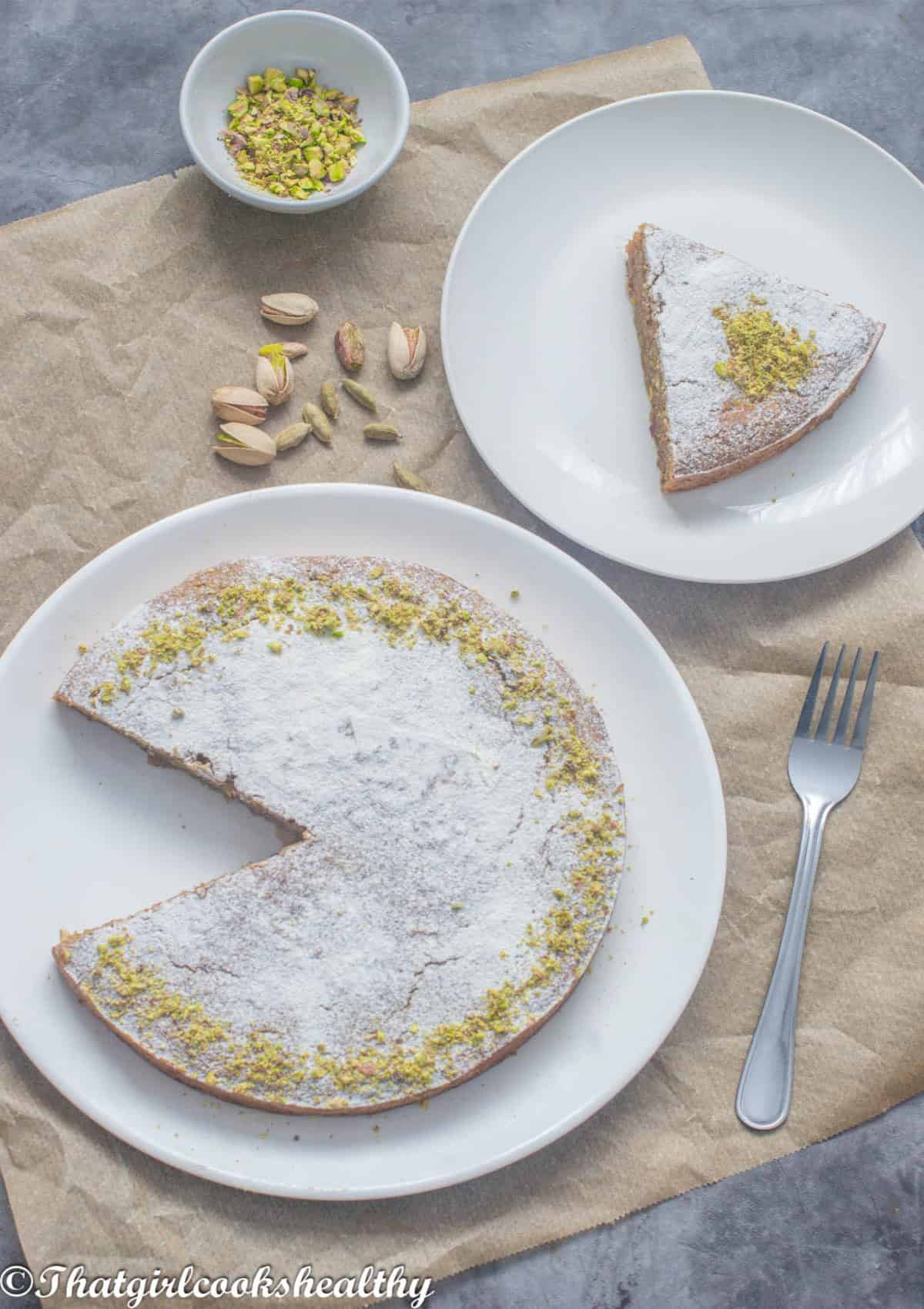 partly cut cake with garnish