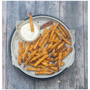 fries on a plate with dipping sauce
