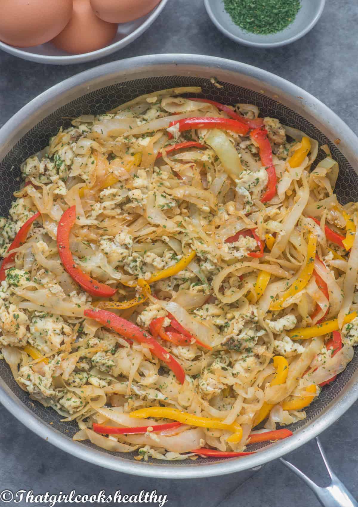 Close up of the egg and cabbage in a skillet