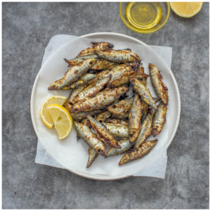 fish on a plate with garnish