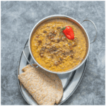 dhal in bowl with garnish