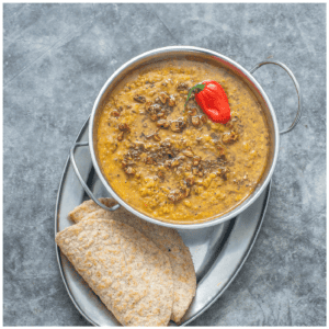 dhal in bowl with garnish
